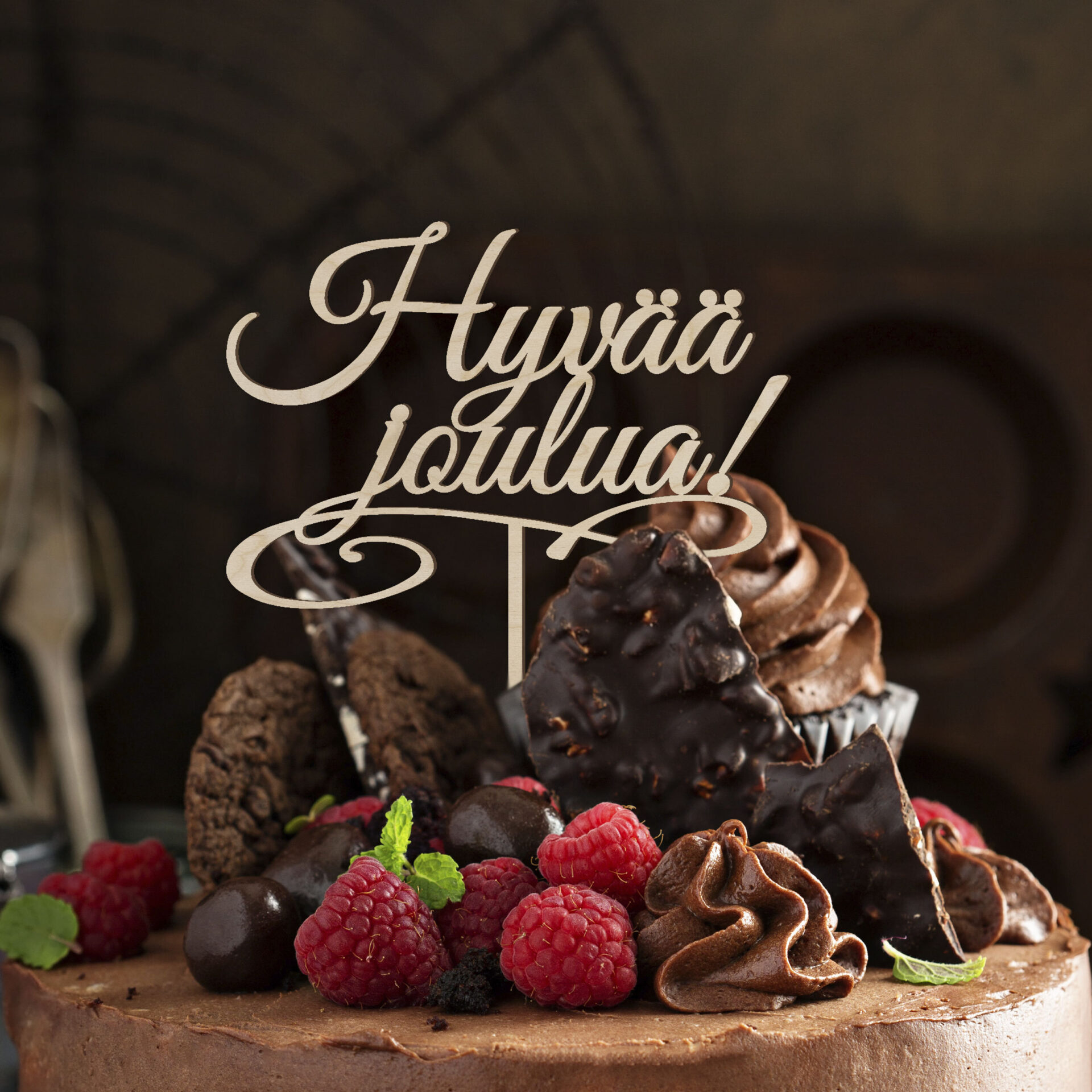 Hyvää joulua-puinen kakkukyltti